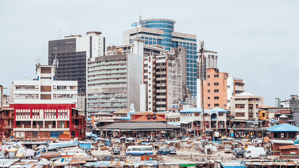 Photograph showing Lagos skyline, with the Balogun market in the foreground.